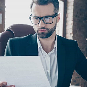 business professional examining document